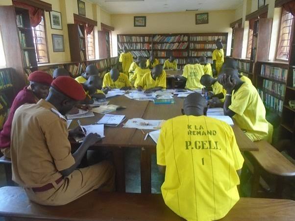 Learning session with people in prison in Uganda during work with Justice Defenders