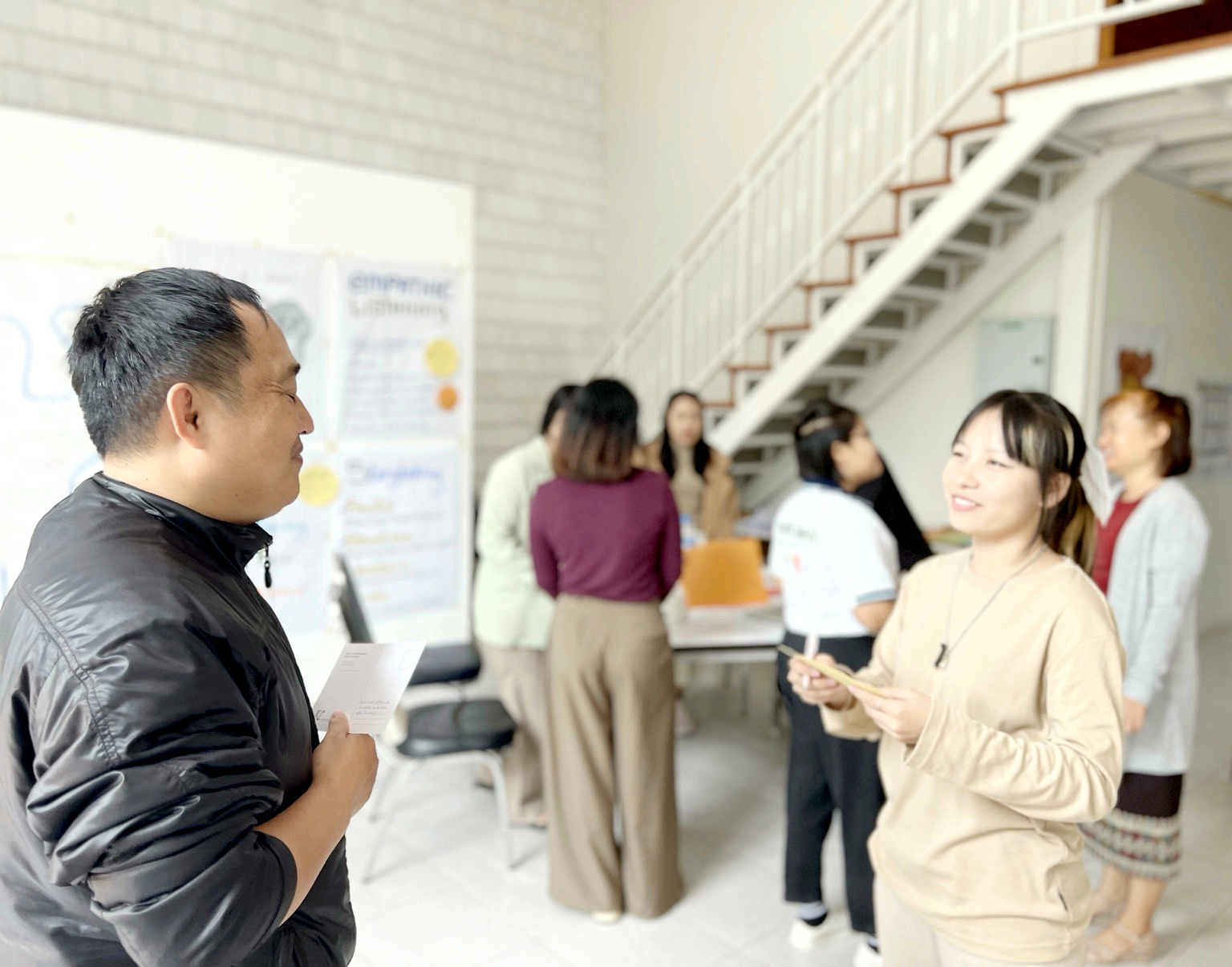 Participants in conversation during a facilitated learning session
