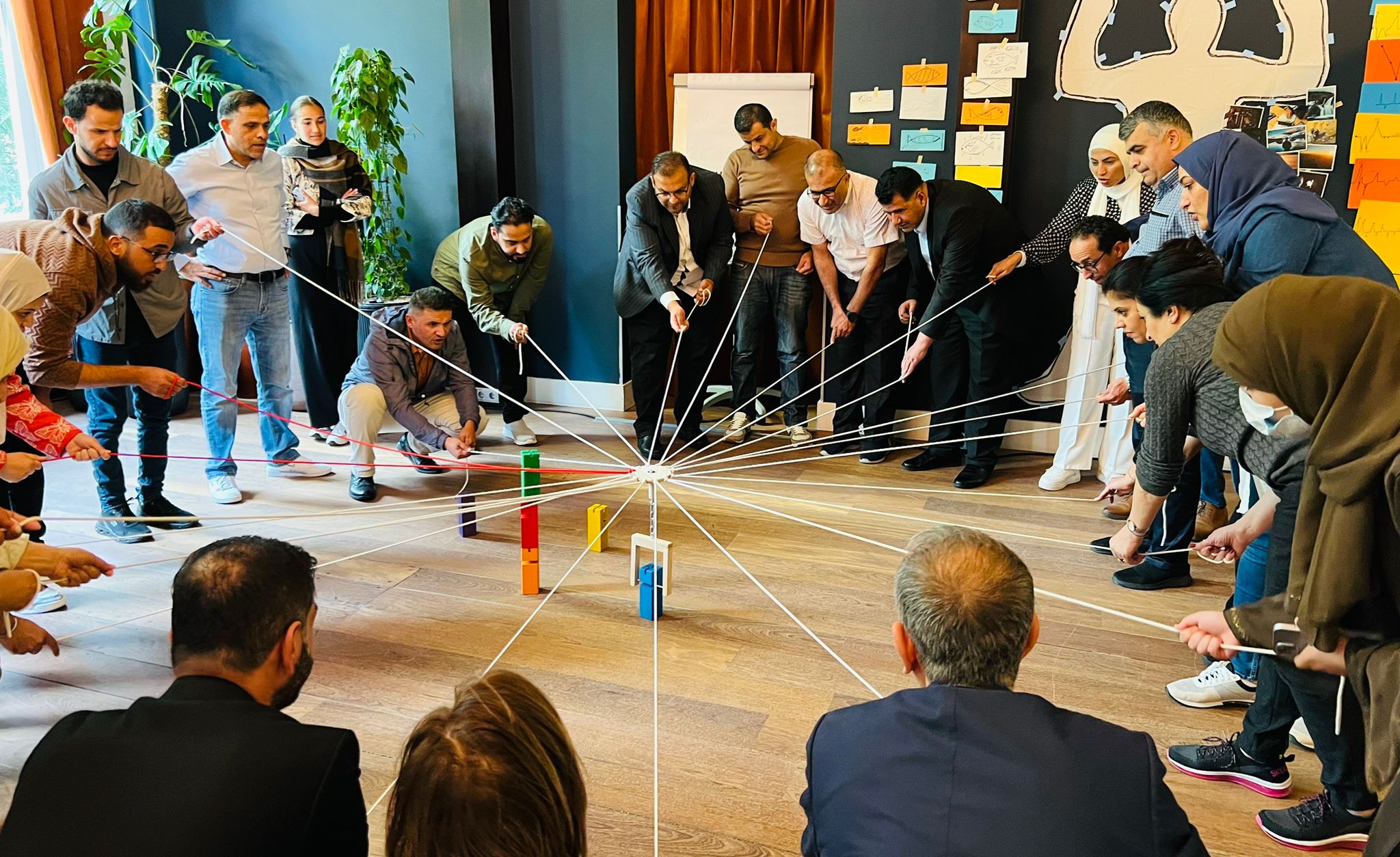Participants collaborating in a team exercise