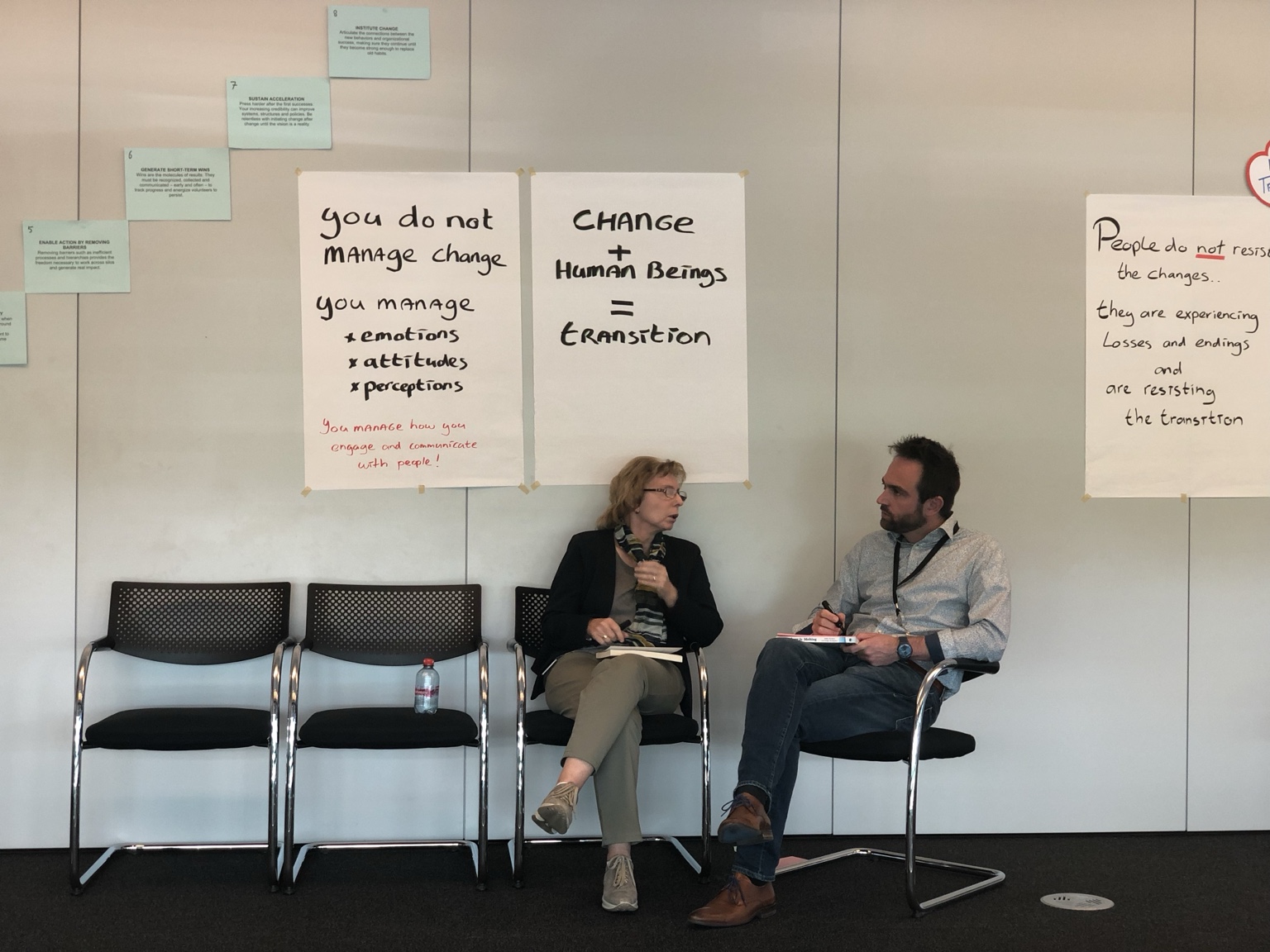 Two participants discussing change during a Bayer learning session