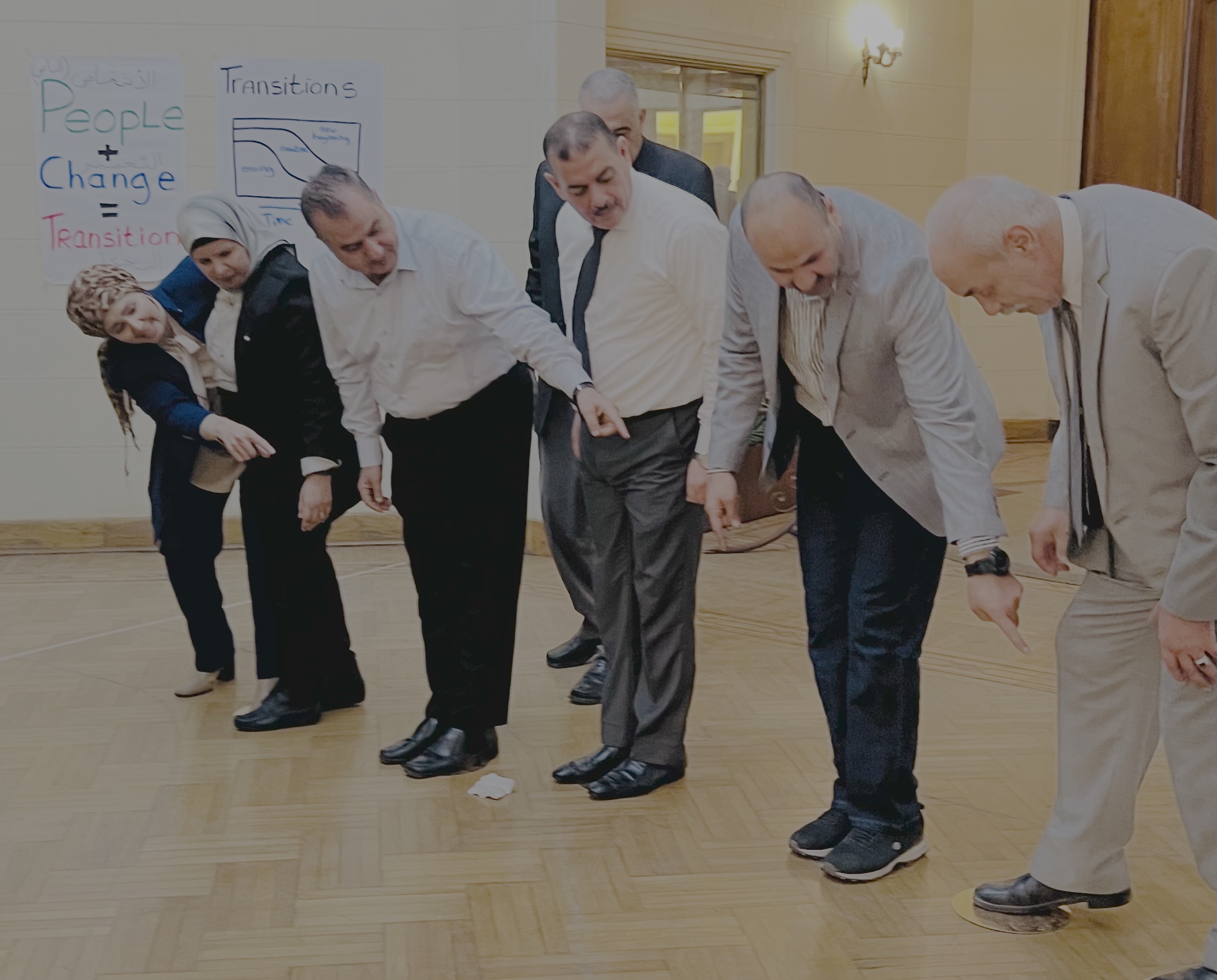 Participants practising and discussing in a learning session
